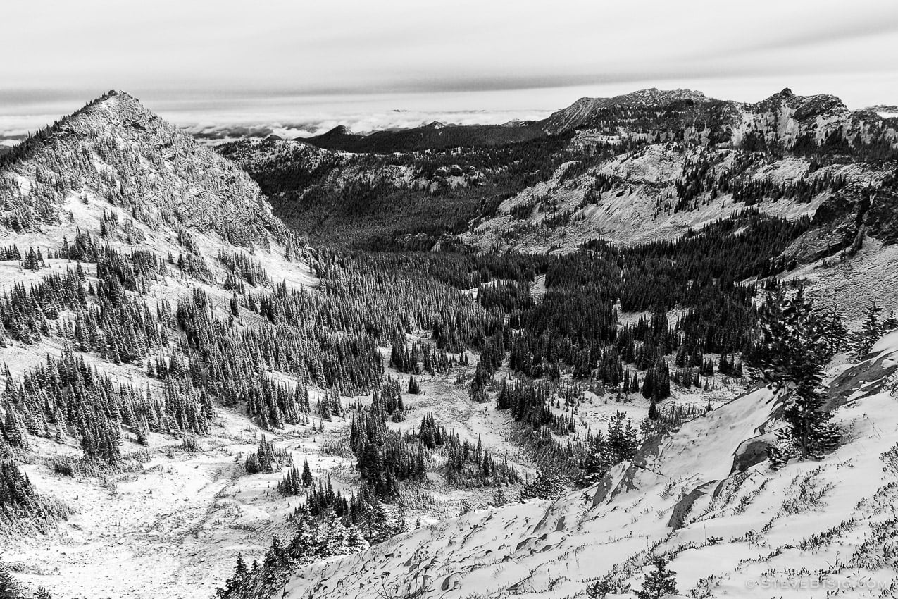 A black and white photograph of McNeeley Peak overlooking Huckleberry Basin after an early Autum snow at Mount Rainier National Park, Washington.