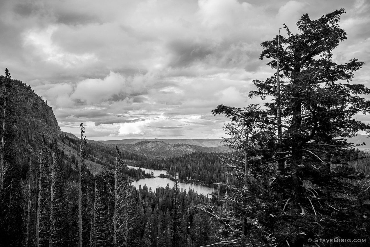 A black and white fine art photograph looking down onto Twin Lakes near Mammoth Lakes, California.