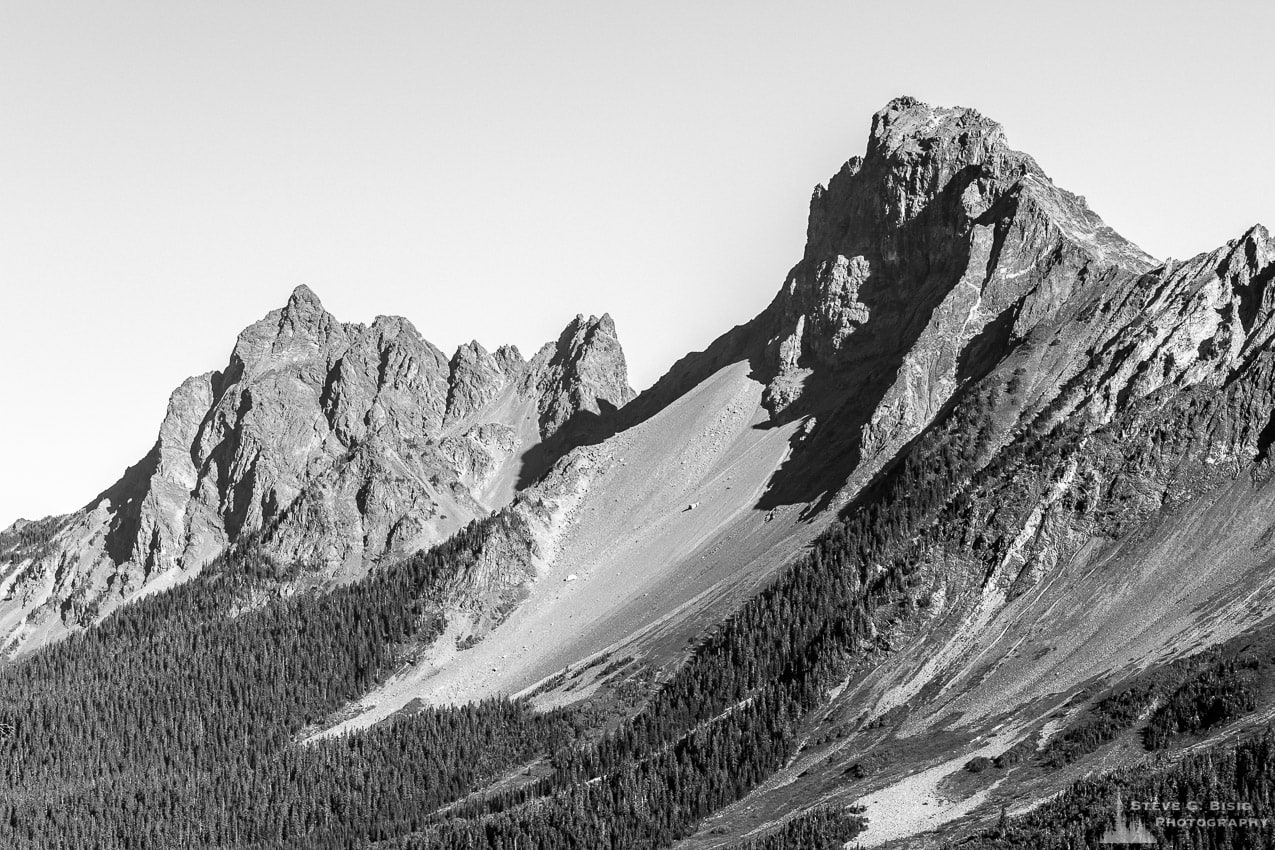 A black and white panoramic landscape photograph of American Border Peak in the North Cascades of Washington State as viewed from Gold Run Pass.