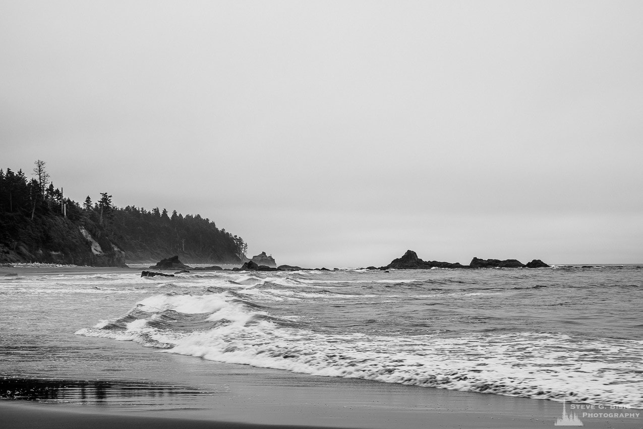 A black and white landscape photograph of the coastline at Ruby Beach in the Olympic National Park in Washington State.