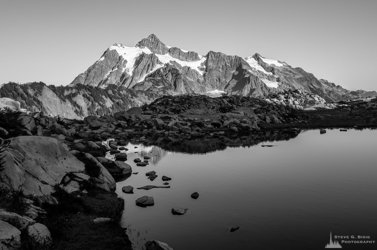 A fine art black and white landscape photograph of Mount Shuksan as viewed from Artist Point near Mount Baker Ski Area, Washington.