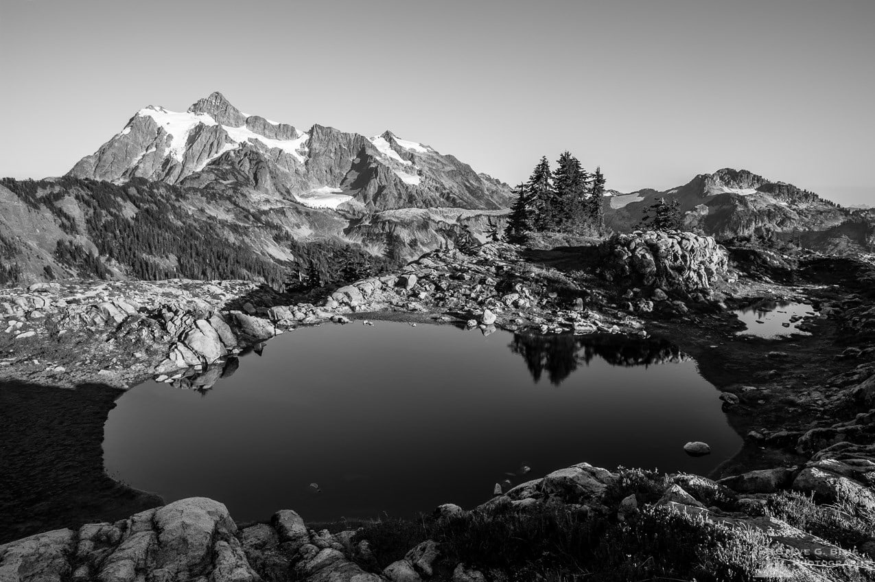 A fine art black and white landscape photograph of Mount Shuksan as viewed from Artist Point near Mount Baker Ski Area, Washington.