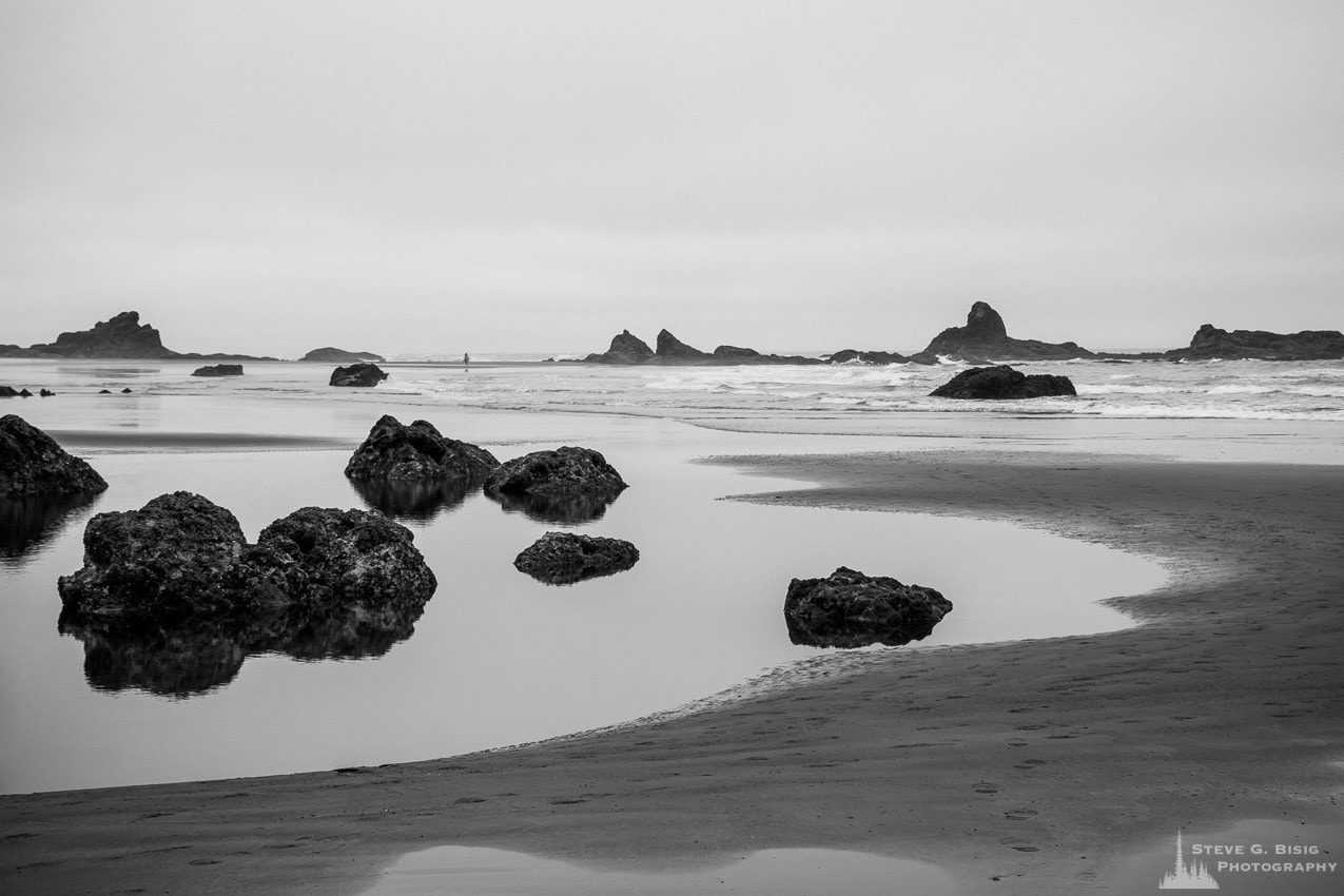 A black and white landscape photograph of rocky tidal pools at Ruby Beach in the Olympic National Park in Washington State.