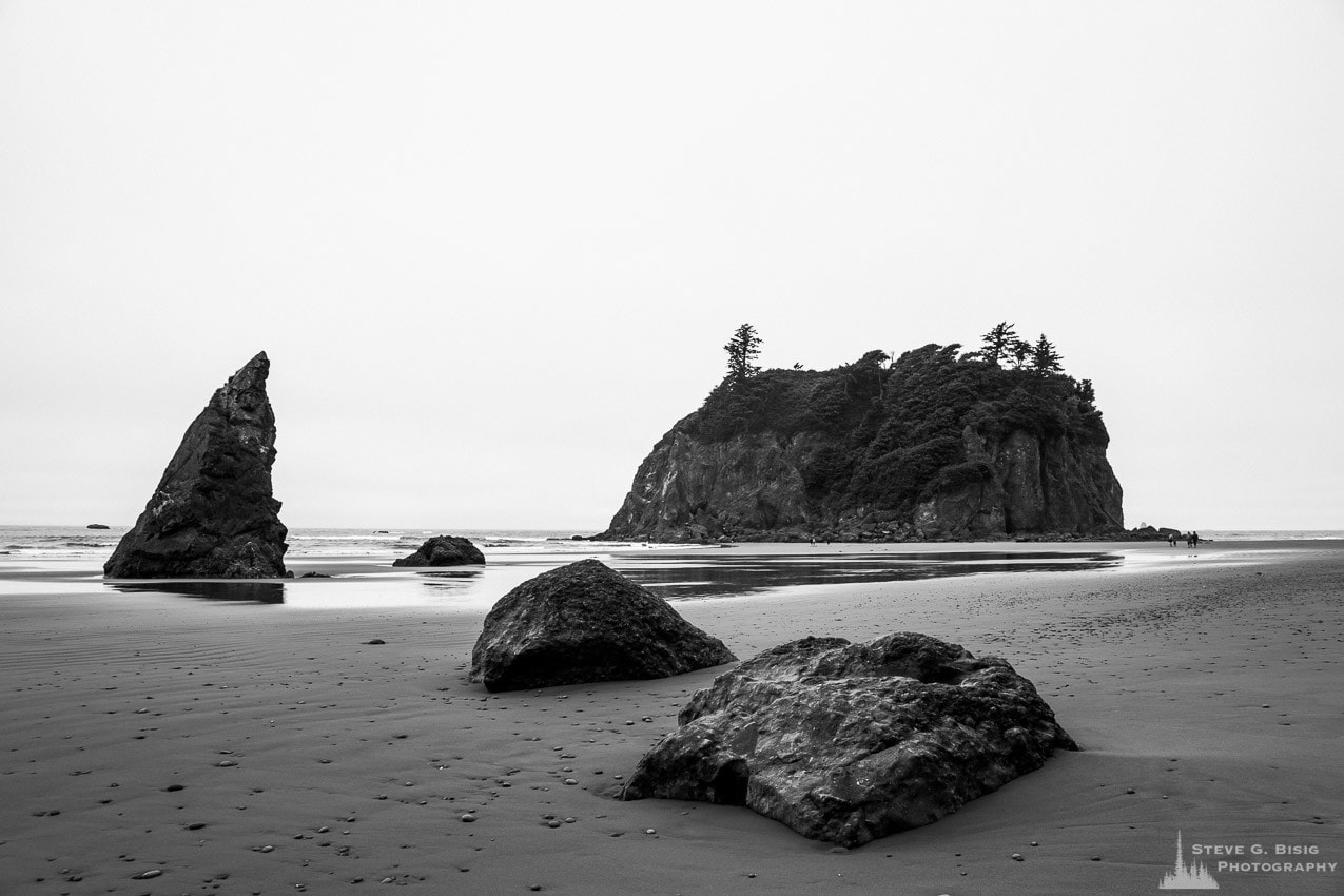 A black and white landscape photograph of Ruby Beach in the Olympic National Park in Washington State.