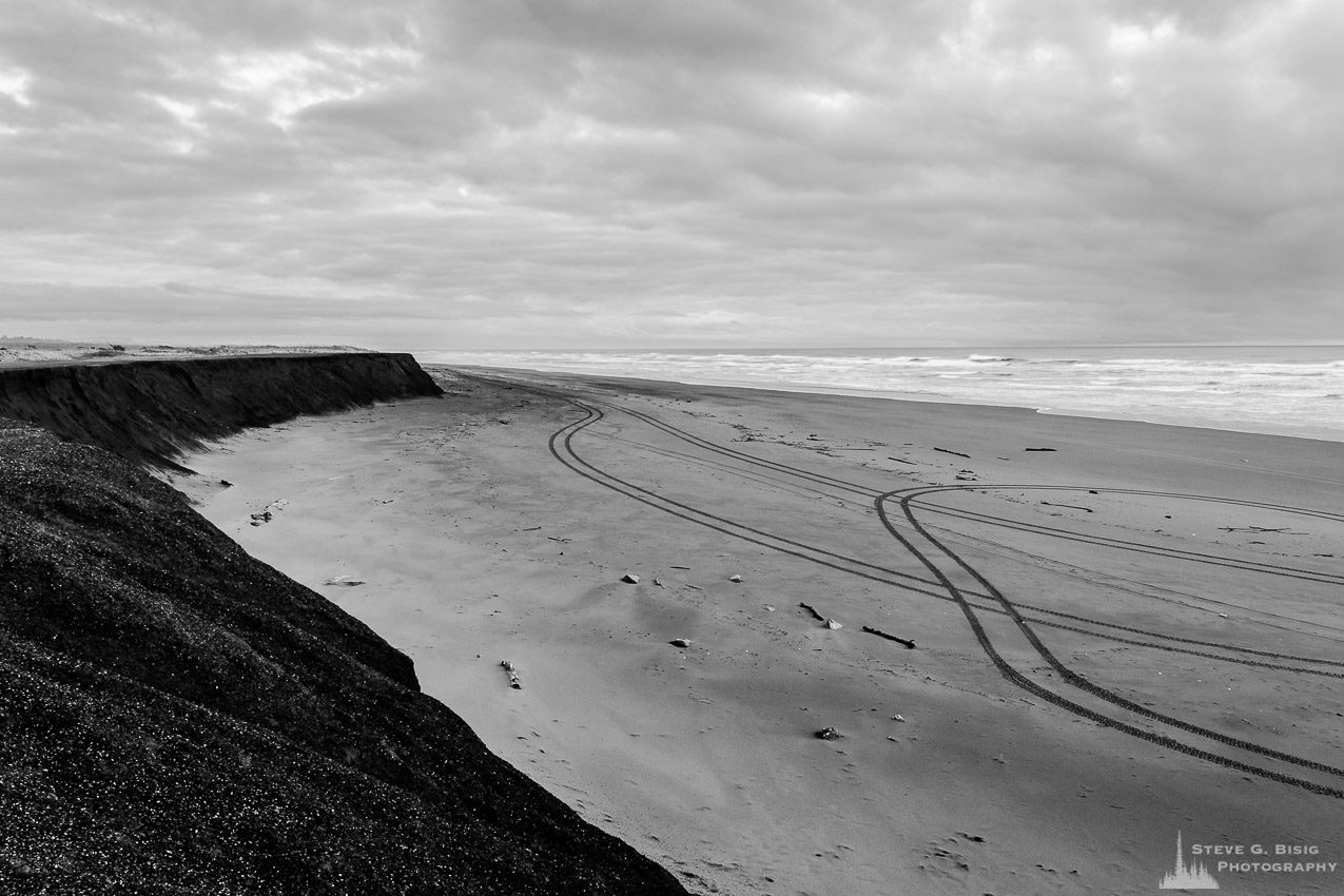 A black and white landscape photograph of the Pacific Ocean and beach at Westhaven State Park near Westport, Washington.
