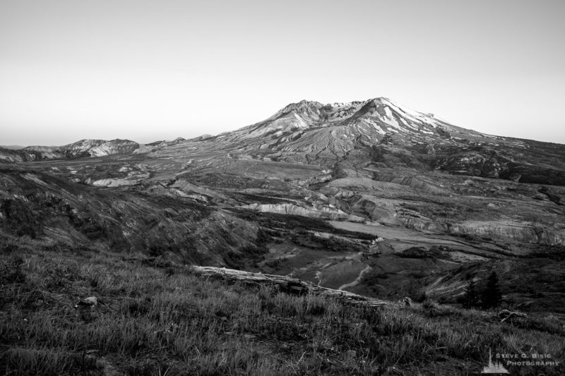 A black and white landscape photograph of Mount Saint Helens during a spring sunset as seen from the Johnston Ridge Observatory, Washington.