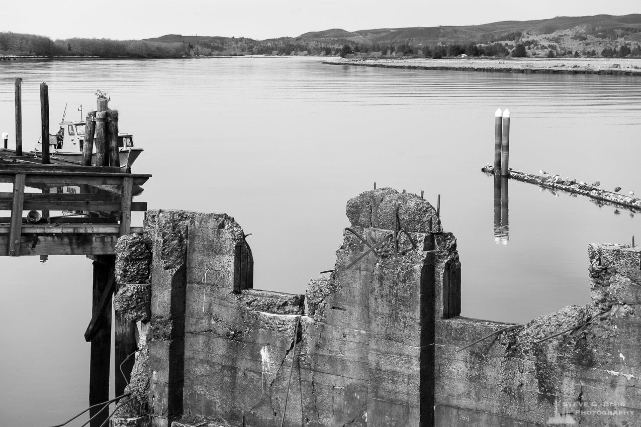 A series of black and white photographs captured along the banks of the Willapa River in downtown South Bend, Washington.