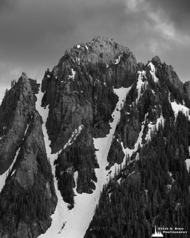 A black and white landscape photograph of a snow-covered Lane Peak at Mt. Rainier National Park, Washington.