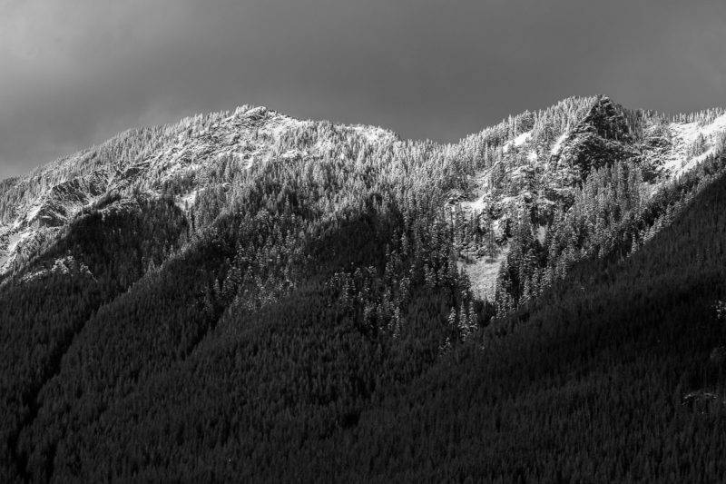 A black and white photograph of Mailbox Peak and Dirty Harry’s Peak, Washington after a spring snowfall.