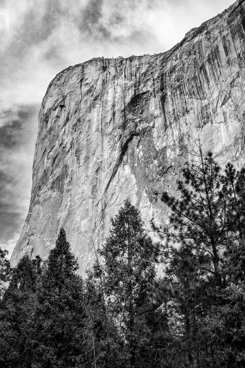 A black and white landscape photograph of the side profile of El Capitan on an autumn morning in Yosemite National Park, Washington.