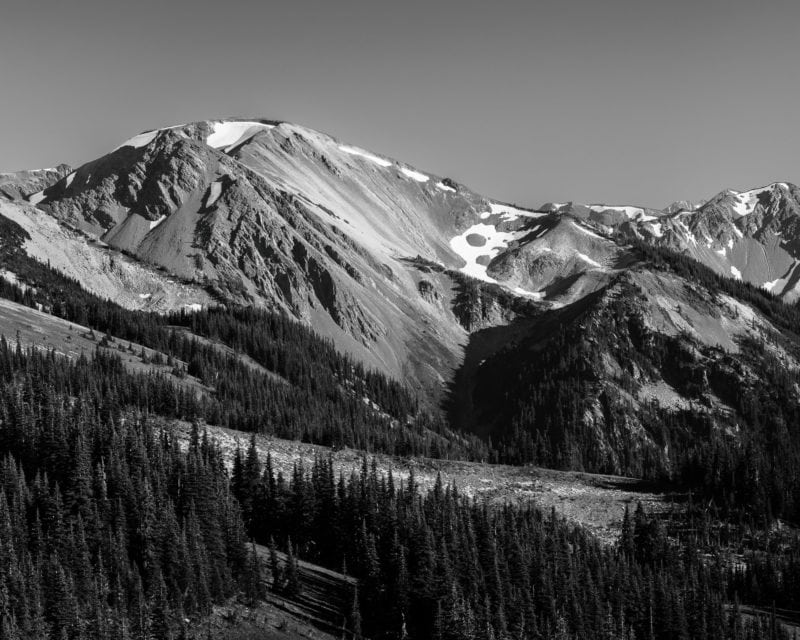 A black and white landscape photograph of Moose Peak (6760-foot-elevation) in the Olympic National Park, Washington.