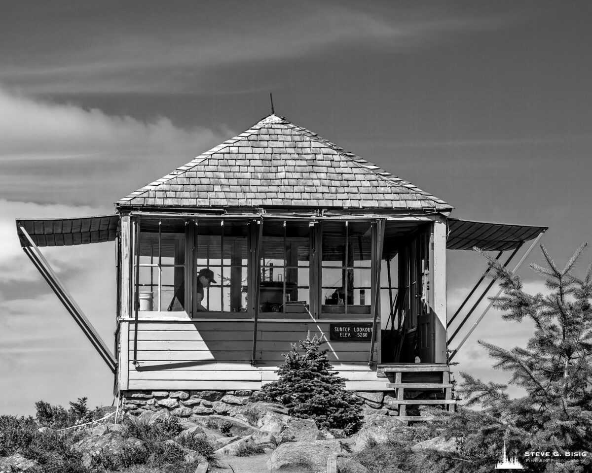 A black and white photograph of the Sun Top Fire Lookout near Greenwater, Washington.