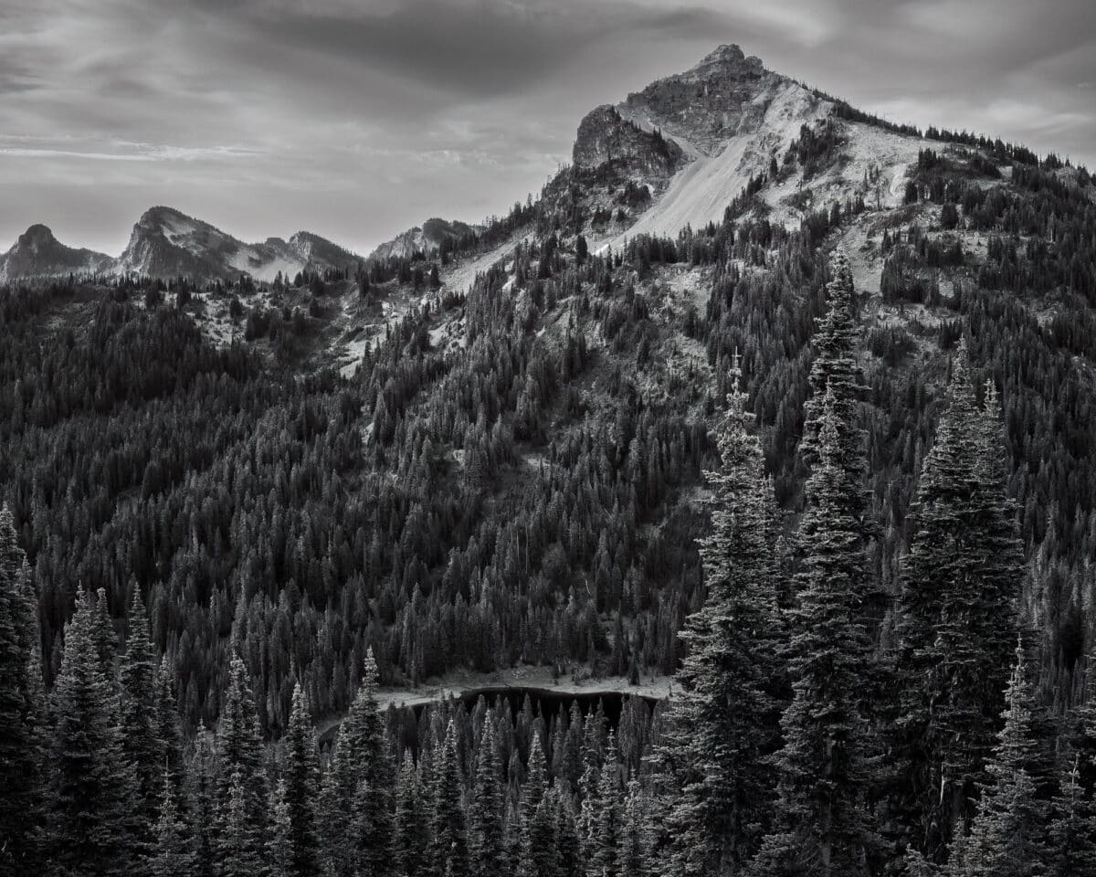A black and white landscape photograph of 6,710 foot Dewey Peak as viewed along the Naches Peak Loop trail near Chinook Pass, Washington.