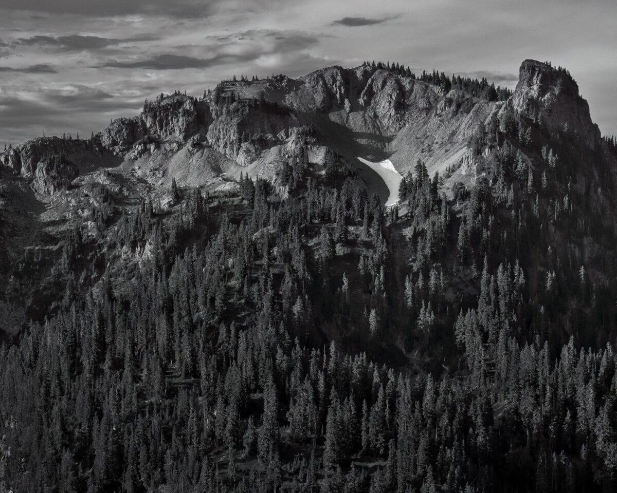 A black and white landscape photograph of 6,337 foot Seymour Peak as viewed along the Naches Peak Loop trail near Chinook Pass, Washington.