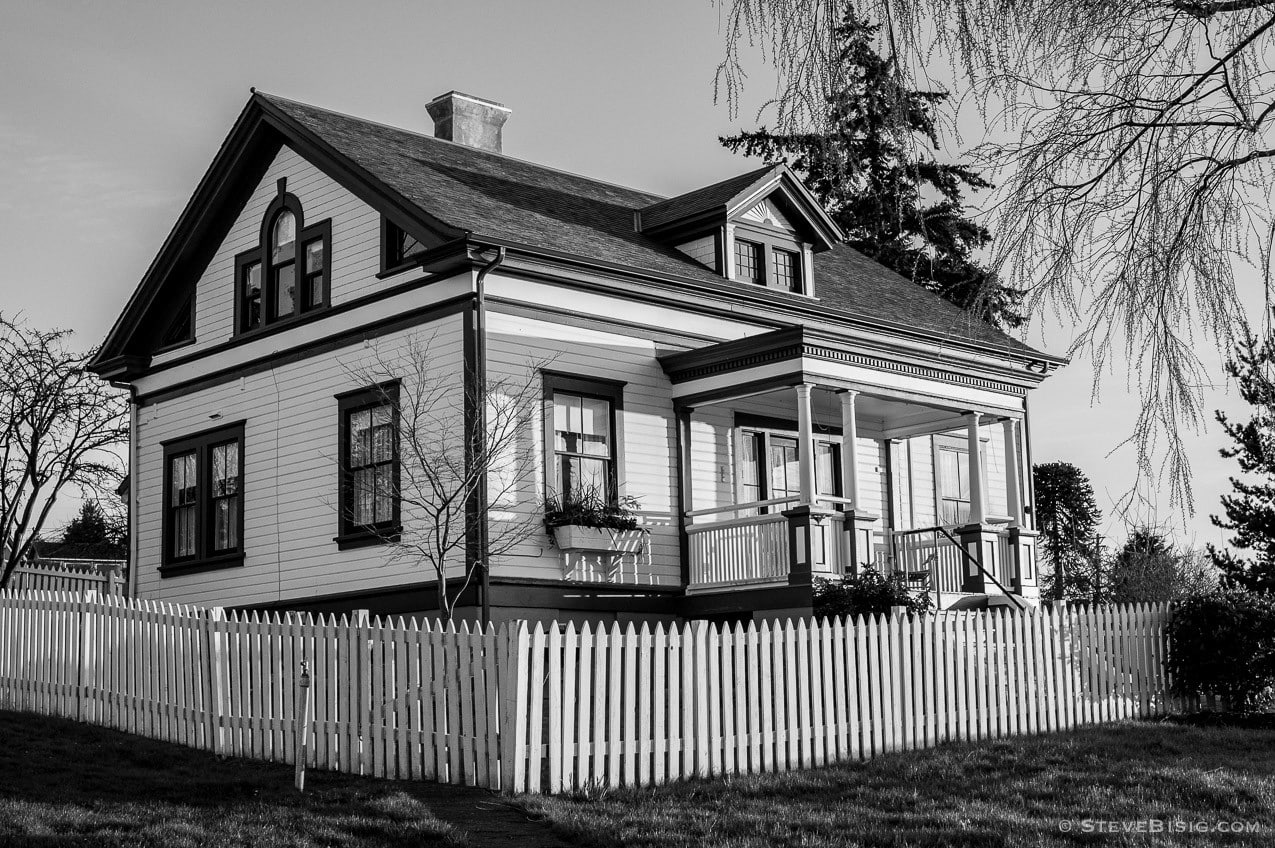 A black and white photograph of the light house keepers house at Browns Point Washington.