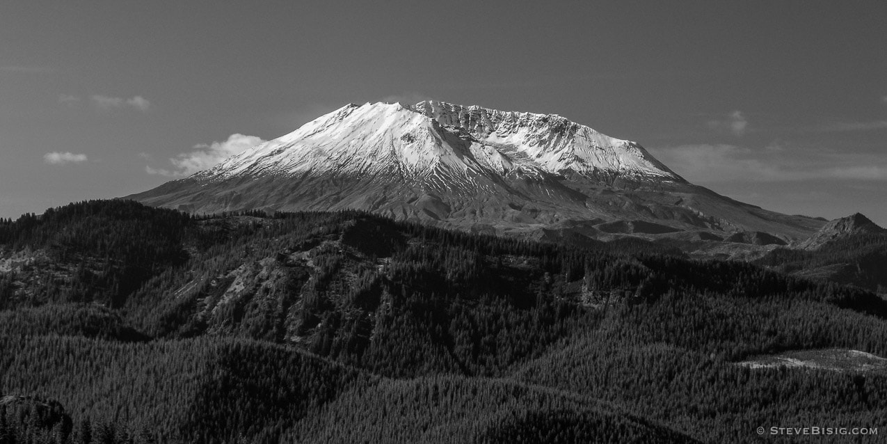 A black and white photograph of a view into the crater of Mount Saint Helens in Washington State as seen from Burley Mountain.